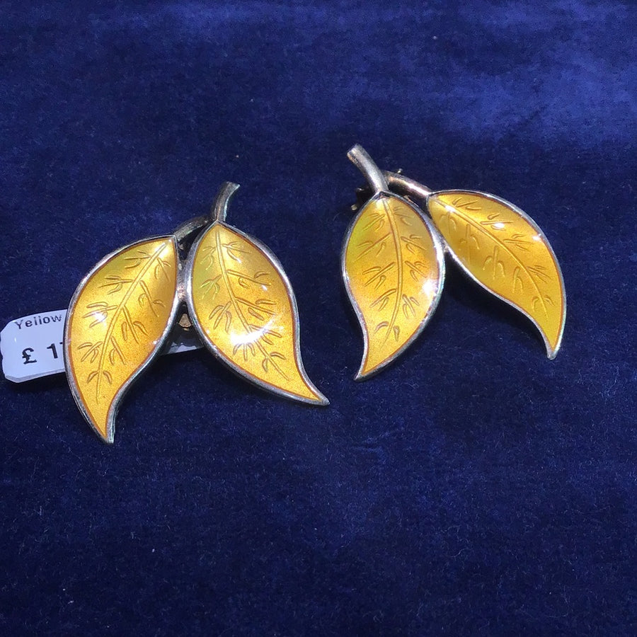 Yellow enamelled double leaf clip earrings by David Anderson