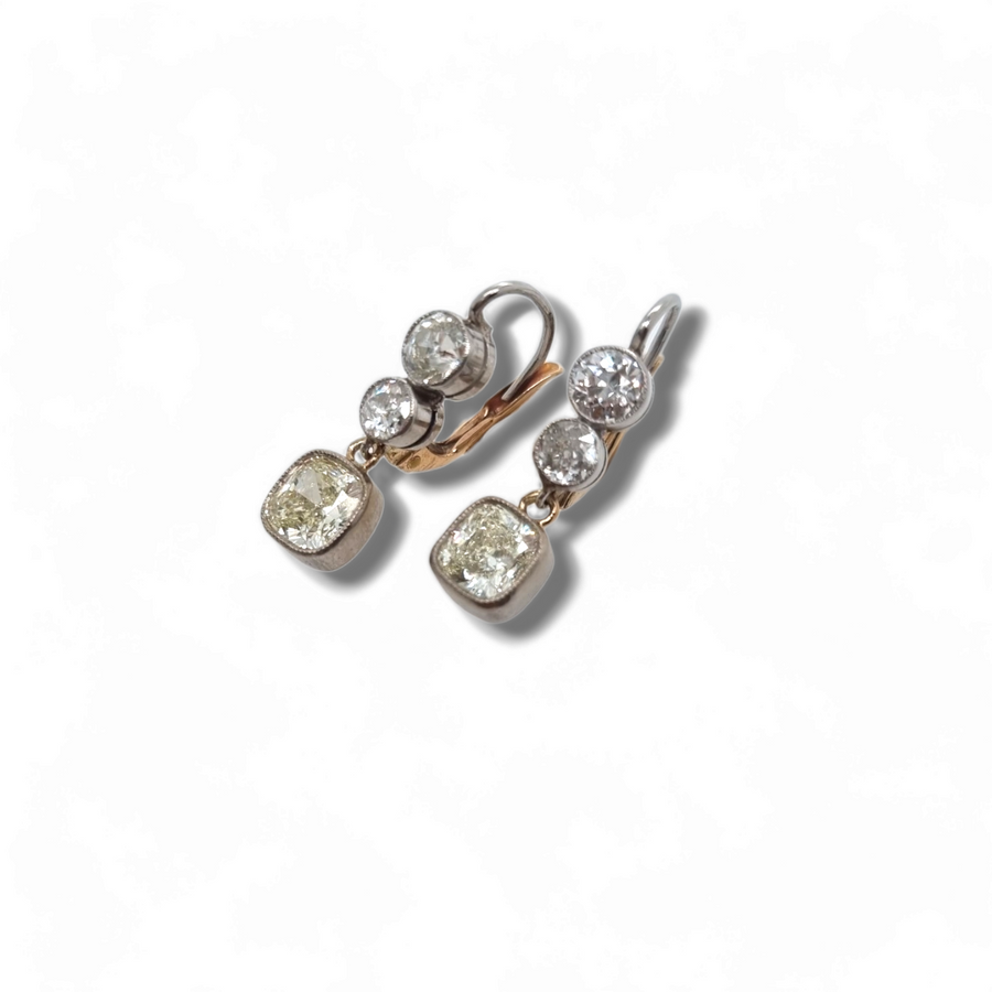Three diamond drop earrings hotsell